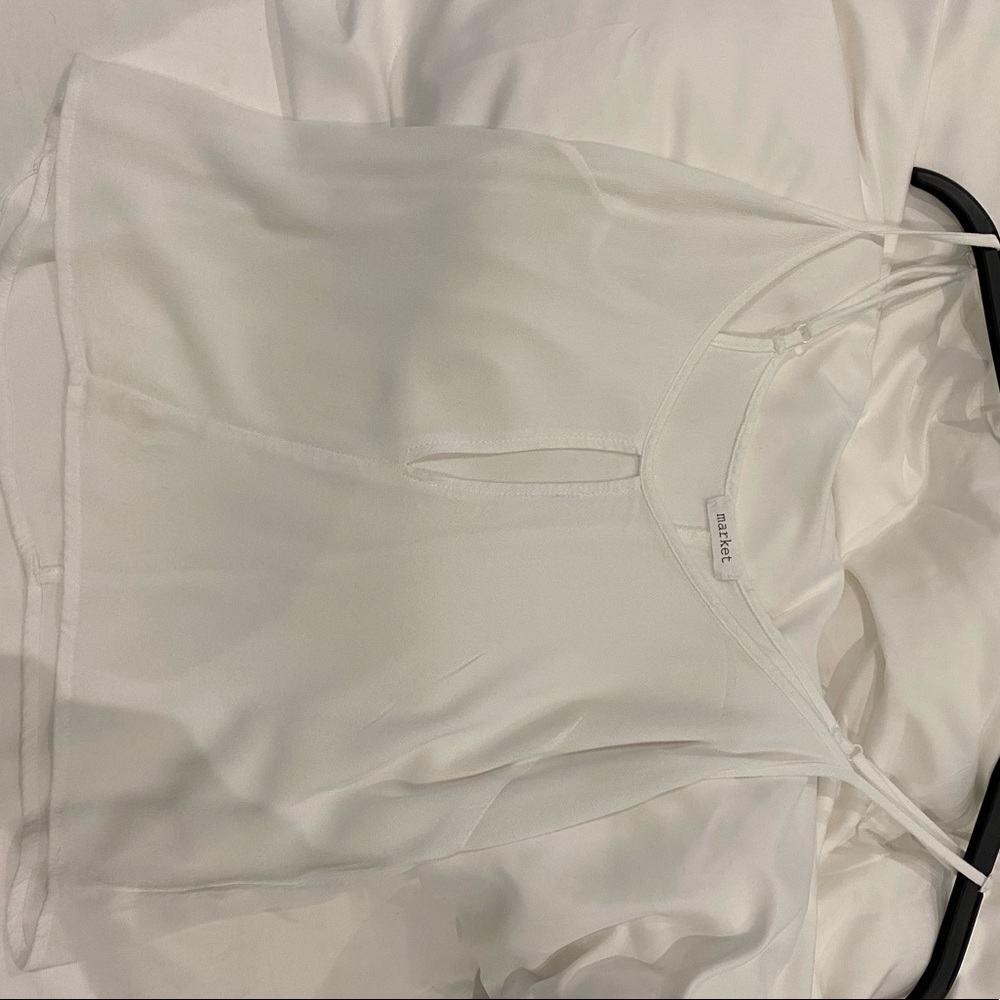 Boutique plain white tank top small slit in front